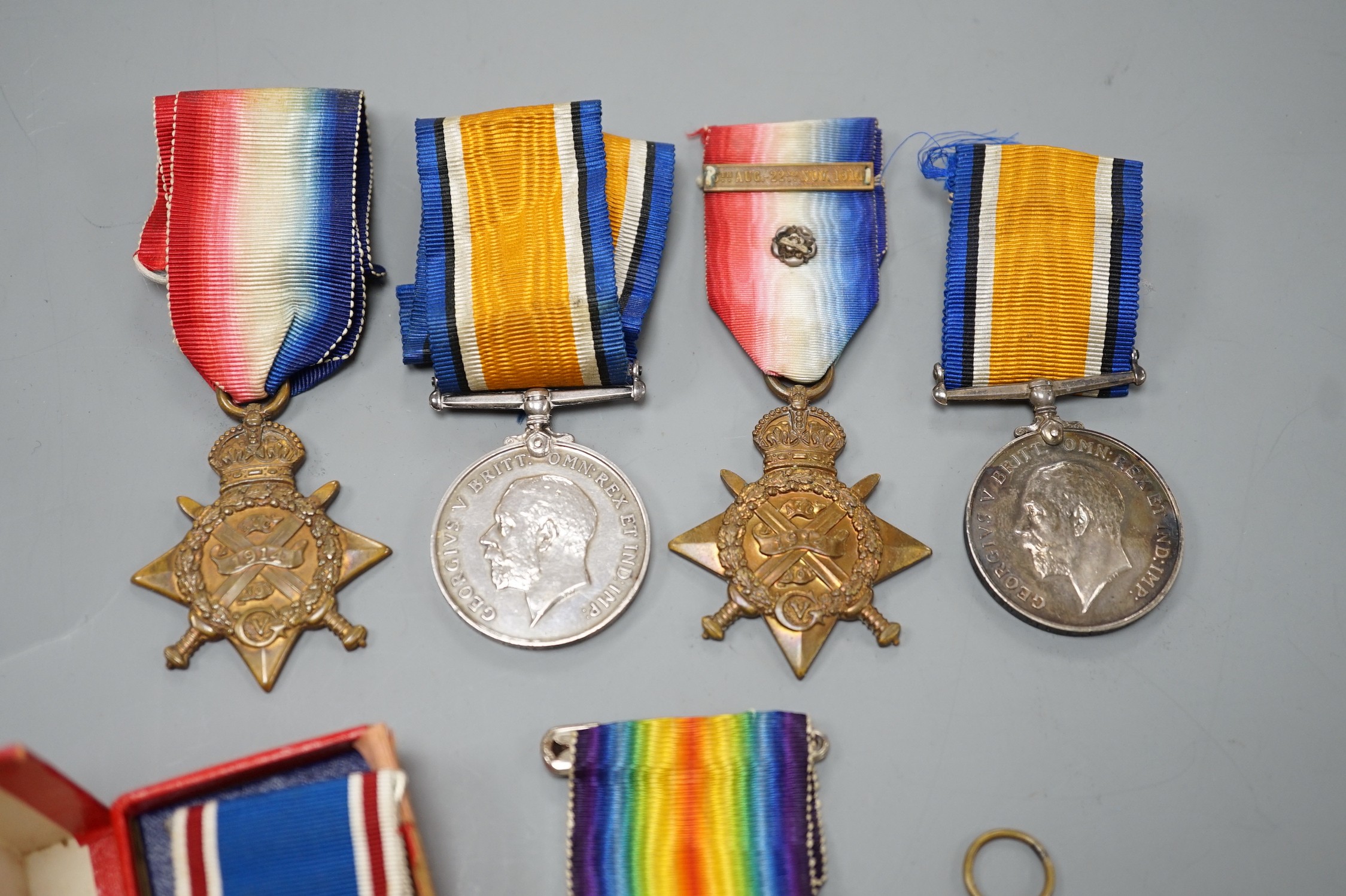 WWI and later medals - Mons star (with bar and rosette) trio to 6480 PTE. F. TURNER 1/DNS., a Mons star pair to L-8608 CPL. E.T. DYER. 1/R W. KENT R., an unnamed Great War medal and a boxed George VI coronation medal (7)